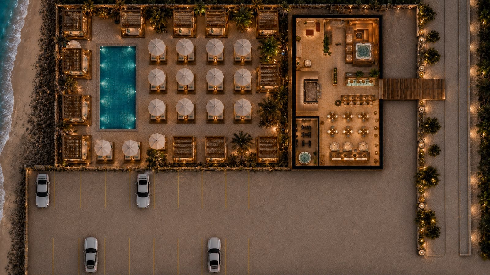 Night aerial view of the beach club and the restaurant by the sea